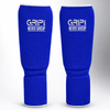 “Blue GRIP shin guards with ‘Never Give Up’ logo, padded boxing/kickboxing shin protection sleeves on white grey background.”