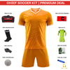 An orange and yellow soccer kit bundle with accessories, featuring a short-sleeve V-neck jersey, matching shorts, a free kit bag, socks, whistle, training ball, captain armband, GK kit, gloves, and ball pump on a white background.