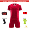 A red soccer kit combo deal displayed on a white background, featuring a short-sleeve V-neck jersey, matching shorts, a black and red duffel bag, black soccer socks with white stripes, a captain armband, and a neon green long-sleeve jersey and shorts set. Text labels identify each included item, with a red header reading 'CHIEF SOCCER KIT | COMBO DEAL' and a Grip Sport logo at the bottom right.