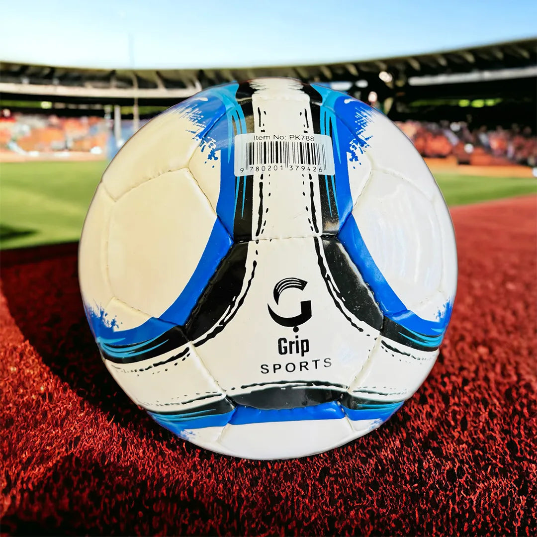 Soccer ball with 'Grip Sports' branding on a sports field