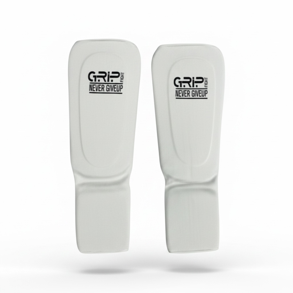 Grip Fight white foam elastic shin and instep guards for martial arts sparring⁠