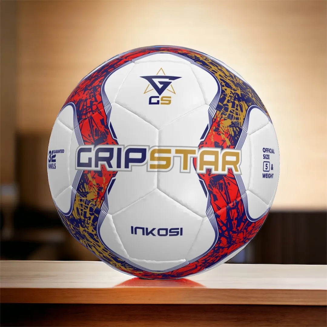 Colorful soccer ball with 'Grip Star' and 'Inkosi' branding on a wooden surface.