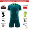 A promotional product graphic for a Chief Soccer Kit premium deal, showing a dark teal soccer jersey and shorts set centered on a white background, surrounded by included accessories: a kit bag, soccer socks, whistle, training ball, captain armband, GK kit, and GK gloves. Text at the top reads 'CHIEF SOCCER KIT | PREMIUM DEAL' and a Grip Sport logo appears at the bottom right.